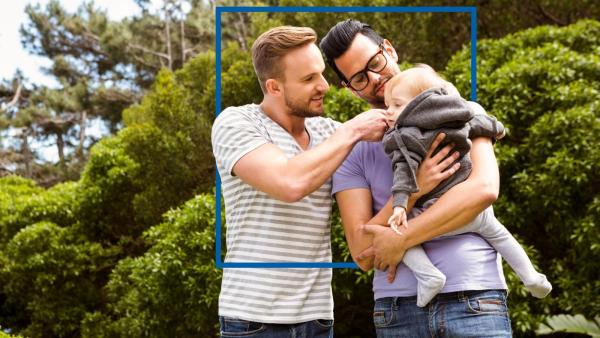 Zwei Männer und einKind