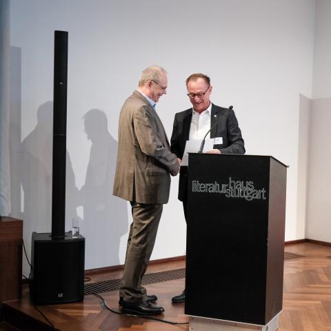 Herr Müller und Herr Hartmann am Rednerpult